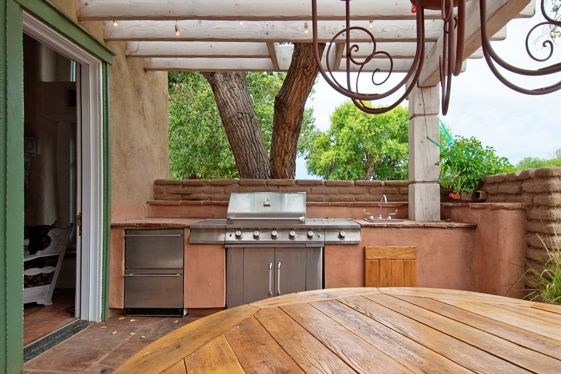 Outdoors Kitchen with Built-In gas grill on a deck